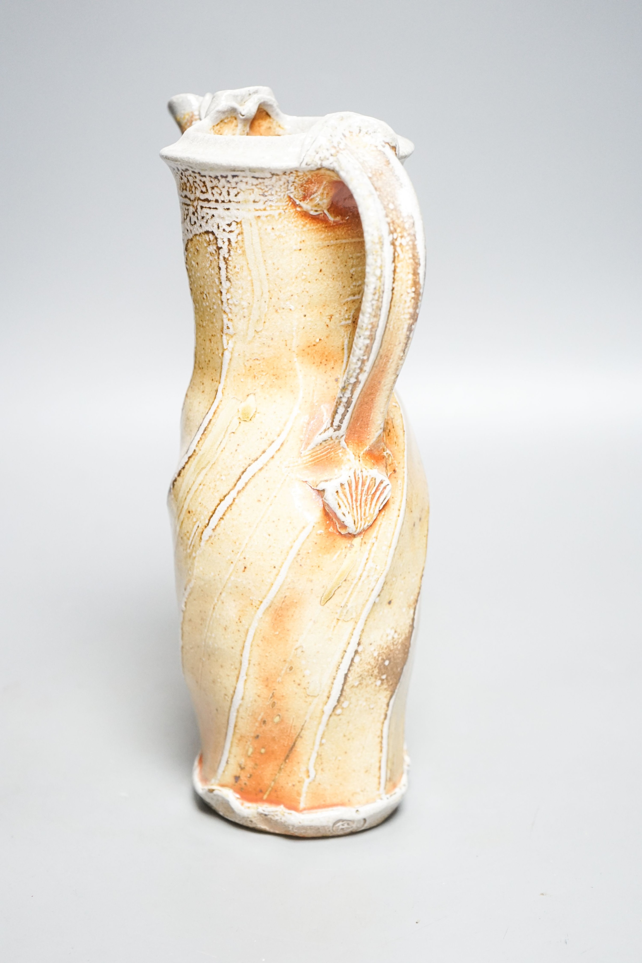 Ruthanne Tudball (b.1948), a soda fired stoneware spouted ewer 28cm